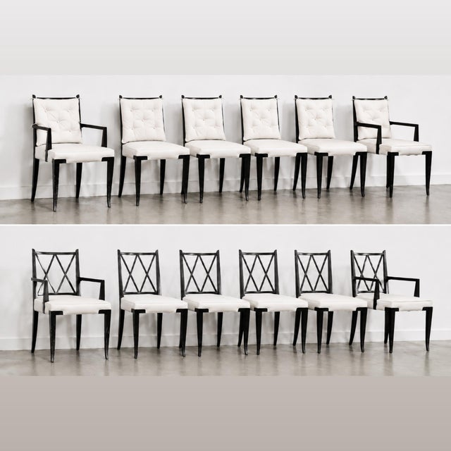 A classic set of six ebonized mahogany dining chairs designed by Tommi Parzinger for Parzinger originals, circa 1950. Two...