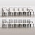 A classic set of six ebonized mahogany dining chairs designed by Tommi Parzinger for Parzinger originals, circa 1950. Two...