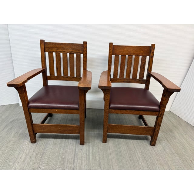 Design Plus Gallery presents a Pair of Mission Style Armchairs in the Arts & Crafts Design Style. The chairs are made of...