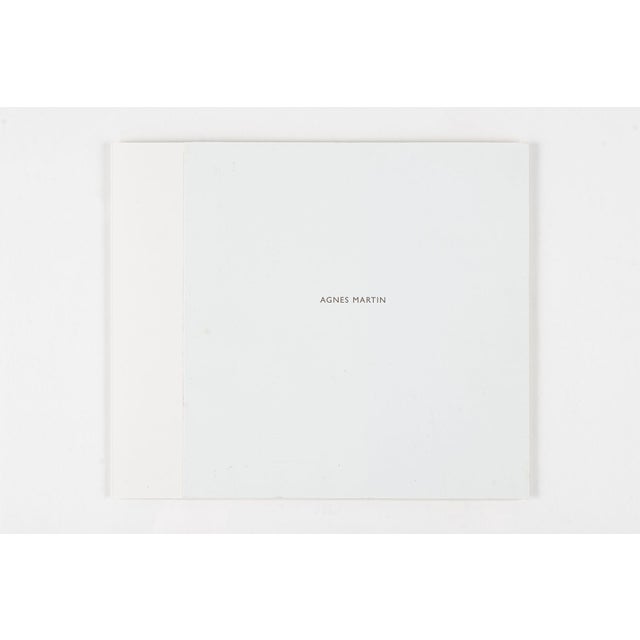 Set of 10 original limited edition lithographs on vellum parchment by Agnes Martin. Two folio envelopes. Unframed. 1990s....