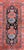 Woven in the early 20th century in western Iran, this Persian Hamadan rug features a striking central medallion filled...