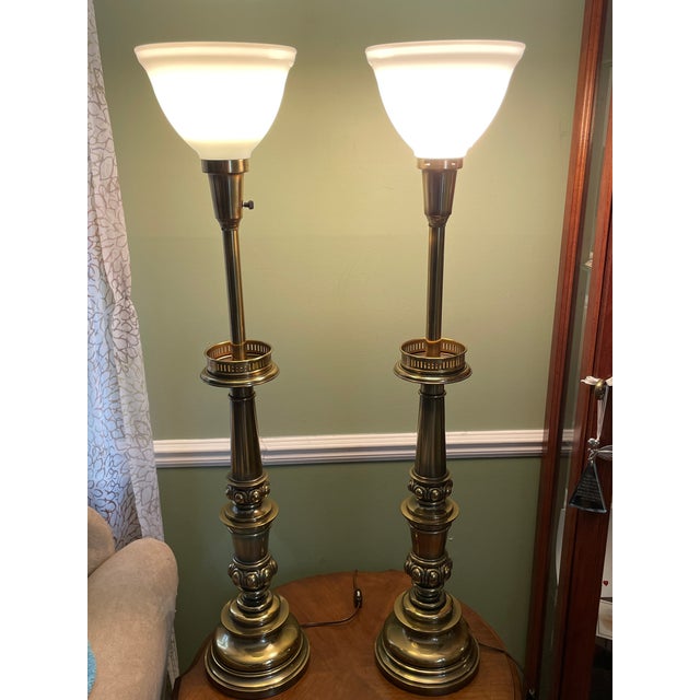 Pair of Vintage MCM Stiffel Brass Torchiere Table Lamps with Milk Glass Diffuser Shades 38" A pair of solid high-quality...