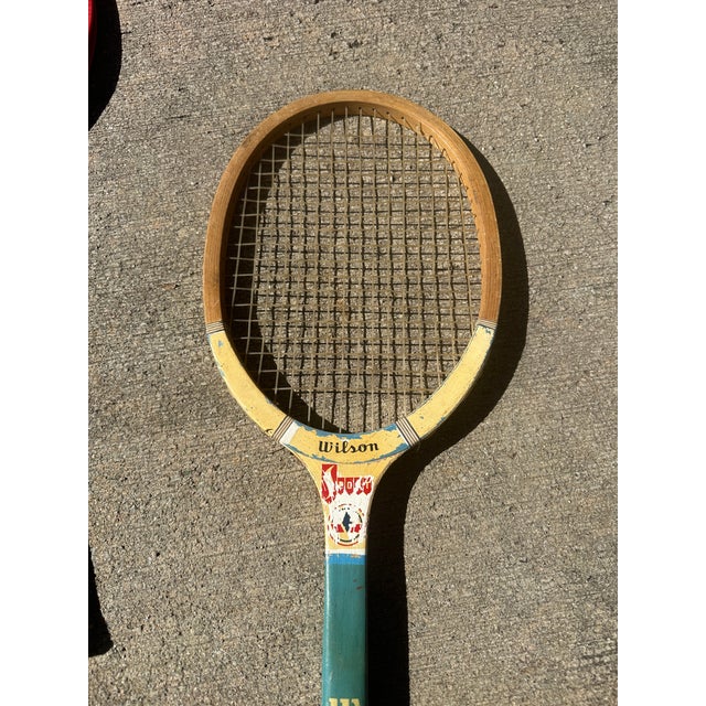 1970s Collection of Vintage Wooden Wilson Tennis Rackets With Cover and Blue and Yellow Accents For Sale - Image 5 of 9