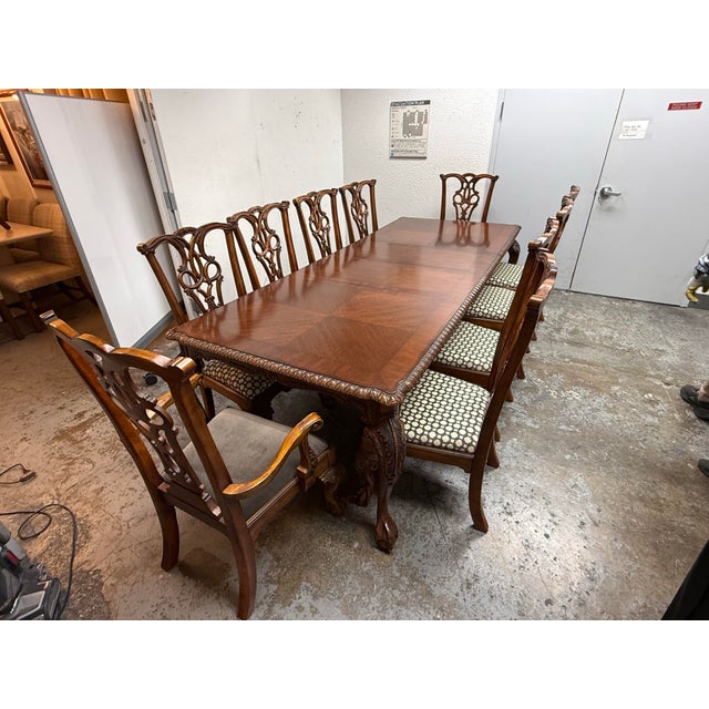 Design Plus Gallery presents a Chippendale Revival Extension Table + Ten Chairs Set. Built from hardwoods and fine...