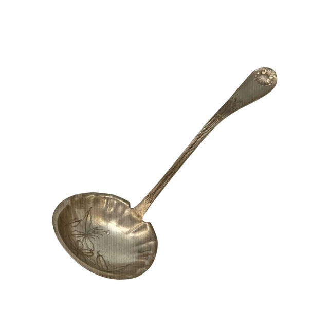 Experience the elegance of a bygone era with this exquisite 1889 Towle Mfg. Co Shell II Pattern Large Soup Ladle, graced...