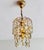 Add a touch of timeless French romance to the cozy corners of your home with this exquisite vintage waterfall crystal...