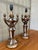 A Pair Of Mid Century Hollywood Regency Neoclassical Revival Style Trophy Table Lamps. Circa 1960s Features a faux-aged...