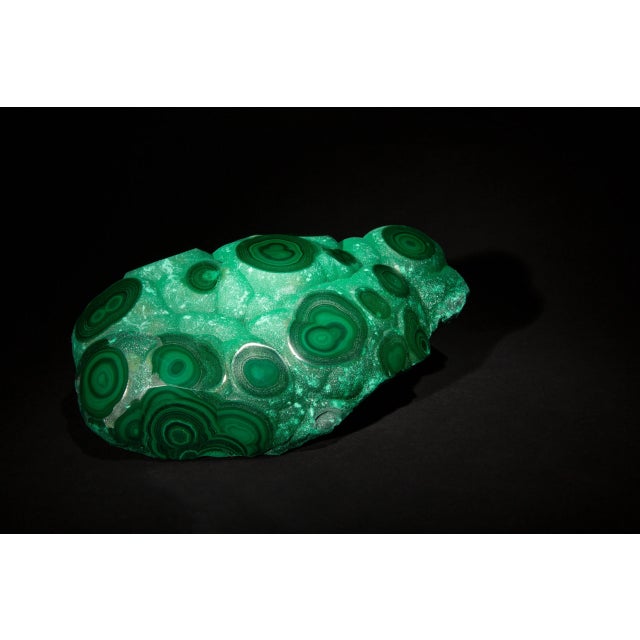 This exquisite malachite specimen, measuring 9 inches by 6 inches by 3.25 inches, showcases the intricate beauty of...