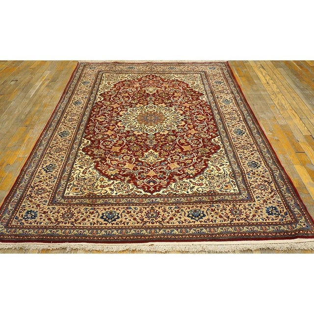 This exceptional 1950 Mid-Century Persian Esfahan rug represents the peak of classical urban weaving traditions from...