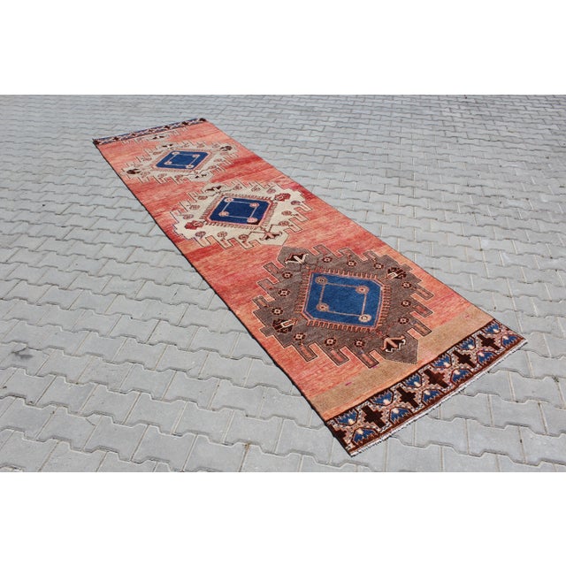 This beautiful, traditional vintage, hand knotted Turkish runner is approximately 60 years old. It is handmade of very...