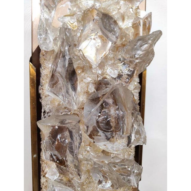 A rare illuminated wall sculpture, attributed to cosack leuchten. This rare wall lamp consists of beautiful broken glass....