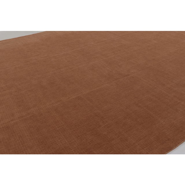 Hand-knotted in wool, this 12x15 rug is a rich new addition to Rug & Kilim’s Textural rug collection, featuring a...