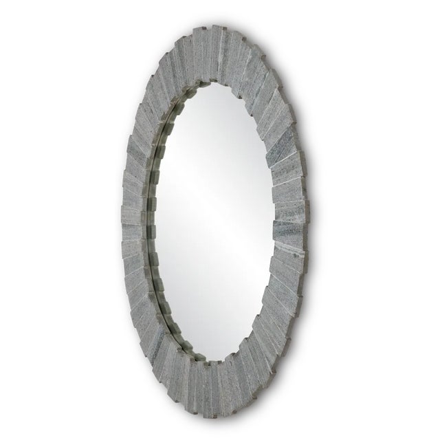 The Dario Round Mirror is a seriously sturdy decorative mirror. Made of slices of marble in varying thicknesses and...