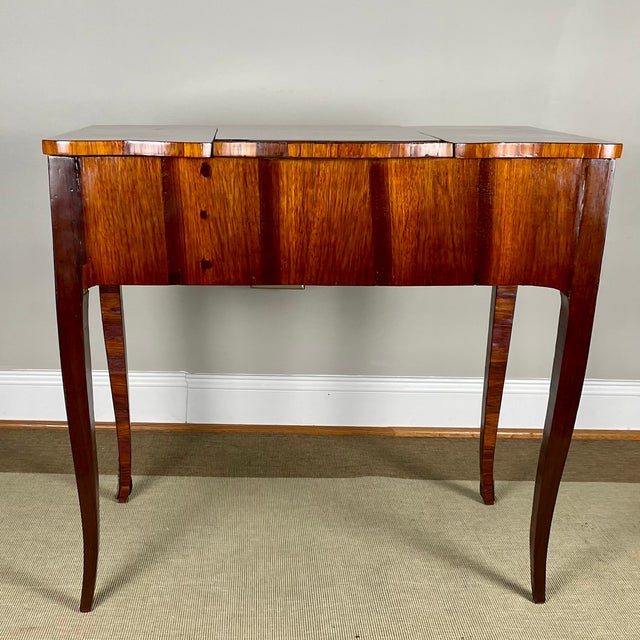 This Louis XV/XVI transitional period coiffeuse (table de toilette), made in Paris during the third quarter of the 18th...