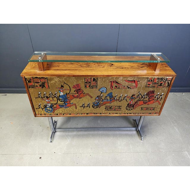 Mid century bar counter by Denisco featuring a chromed metal base, a wooden case with a small glass top and a painted...