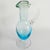 Vintage mid-century Italian Empoli jug in blue transparent and green glass with a twisted glass handle from the 1950s....
