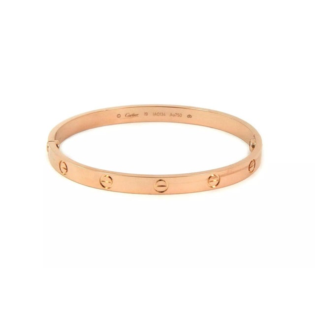 This is the iconic authentic bracelet by Cartier, from the LOVE collection . It is well crafted from 18k pink gold in a...