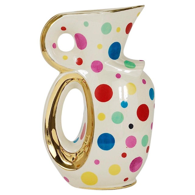 An extraordinary pitcher or jug from the 1950s, part of the "Keralux" series, crafted by Boch Frères in Belgium. This...