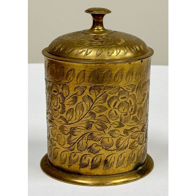 Indian brass lidded trinket box, tea caddy or cigarette holder with hand engraved Mughal floral designs throughout....