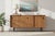 A beautifully restored Mid-Century Modern walnut credenza that showcases the clean lines, exceptional craftsmanship, and...