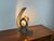 Finely crafted iron table lamp with a yellow crackle glass shade in a Brutalist style, made in Italy in the 1960s. The...