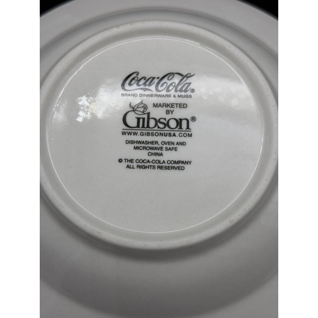 Vintage 16-piece GIBSON Coca-Cola "American Girls" dinnerware set from the 1980s/1990s, featuring pin-up-style...
