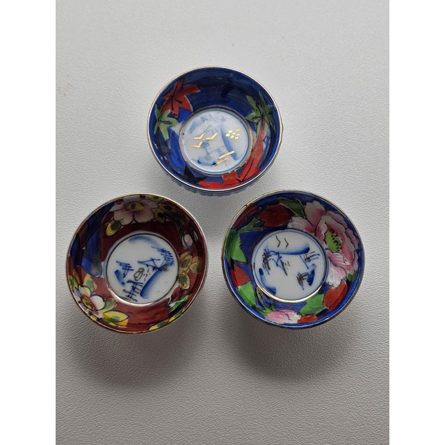 This is a beautiful 1920's set of vintage Japanese sake saucers, soy sauce dishes or condiment bowls. Also known as Kubata...