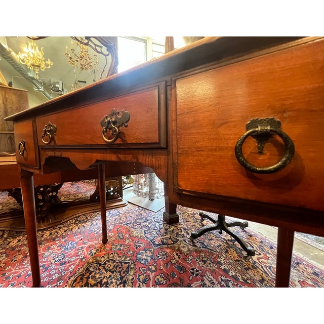 1930s Queen Anne Walnut 3-drawer writing desk with paw feet. 38.25"w x 30.5"h x 18"d