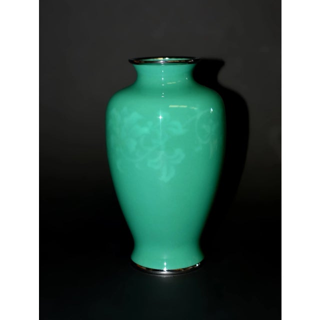 A beautiful pristine condition Ando Jubei wireless cloisonné vase in baluster form. In his signature green enamel,...