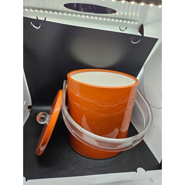 Vintage MCM Kraftware 3-quart spice orange ice bucket with a clear acrylic handle and lid knob. Excellent condition, one...