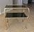 Italian brass 2 tier rectangular side or occasional end table, with newer dark tinted glass insert tops. Unique design...
