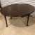 Georgian Queen Anne style oval mahogany drop leaf table with pad feet. Great for extra dining or serving. Center or entry...