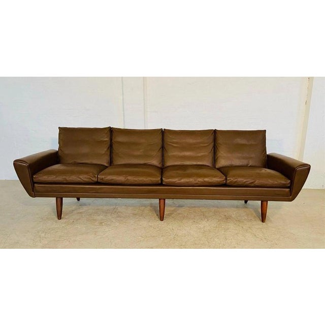An exceptional danish mid-century modern four-seat sofa designed for g. Thams and crafted by vejen polstermøbelfabrik,...