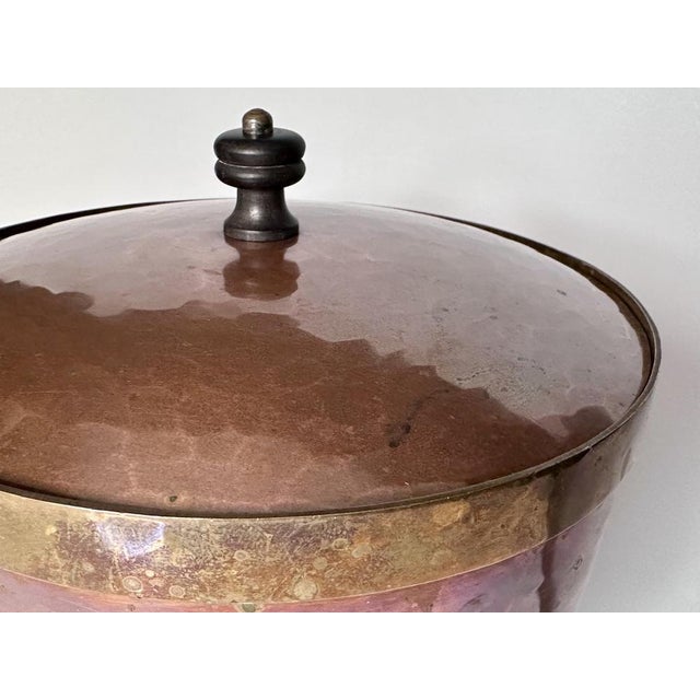 A fine Art Deco bonboniere or lidded bowl in copper and brass, handcrafted around 1930 by the renown goldsmith's workshop...