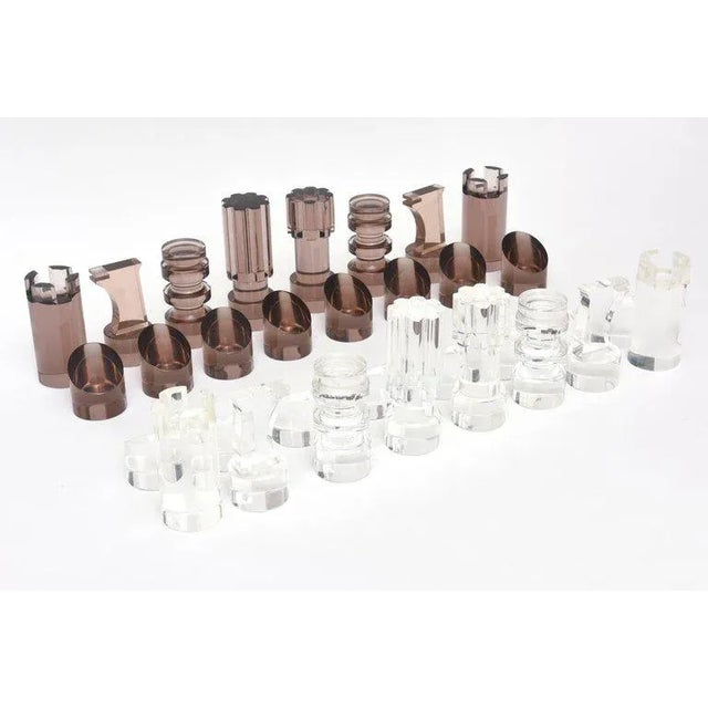 The designer of these fabulous vintage french lucite modernist chess players from the 1970s are by MIchel Dumas who is...