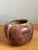 This vintage red geometric patterned ceramic vase brings a lively note of color and graphic character to a shelf, console,...