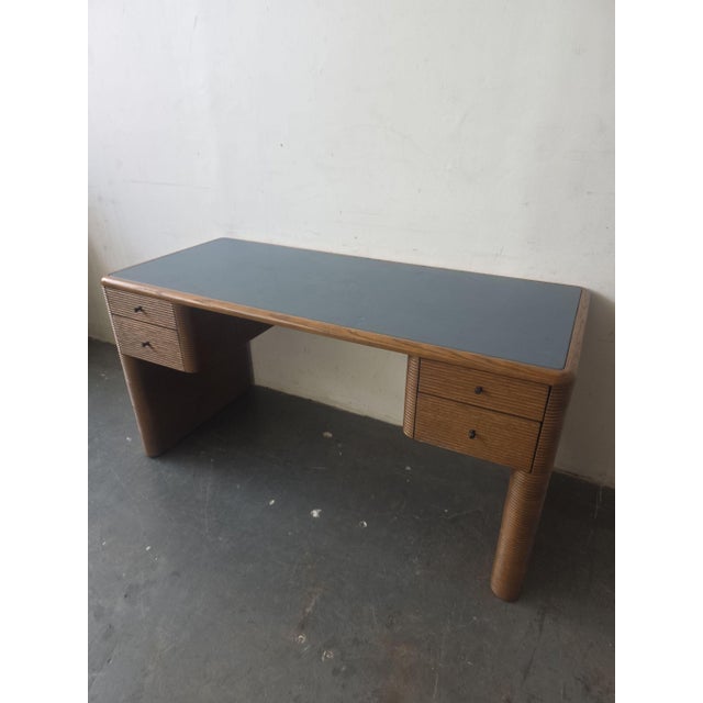 This SOHO Home desk features a stylish wood frame with a smooth black top. It has two sets of drawers on each side for...