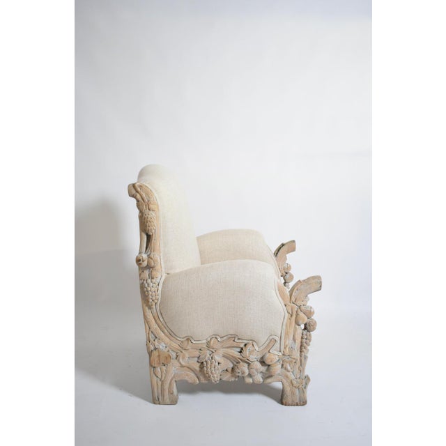 Carved limed oak fruits and foliage armchair, 1970s. Height: 103 cm - 40.55 in Length: 85 cm - 33.46 in Width: 78 cm -...