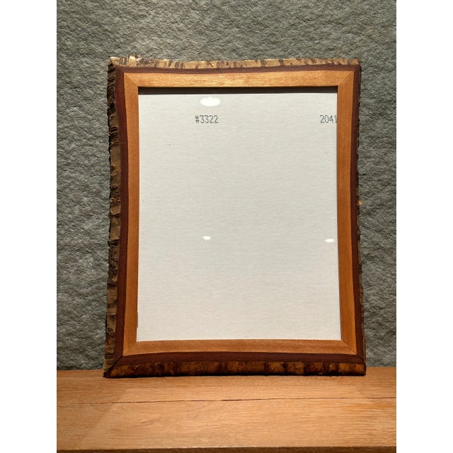 Gorgeous handcrafted 8" x 10" frame made from one birch log, cut to showcase two beautiful light and medium wood tones and...