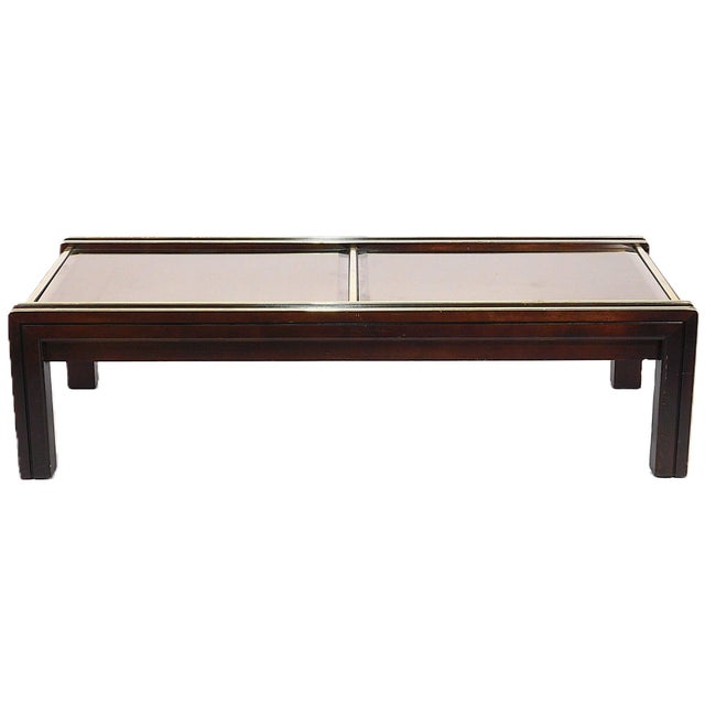 Contemporary coffee table, c. 1980s, with two inset mirror panels and metallic trim, wear consistent with age and use, 15"...