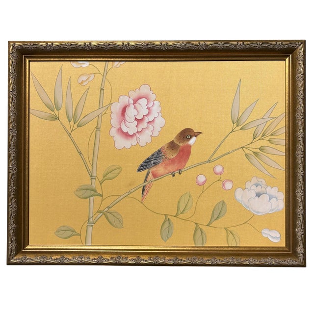 Framed in solid wood gold-gilt moulding from Italy, this painting on golden yellow silk features a bird on a delicate...