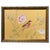 Framed in solid wood gold-gilt moulding from Italy, this painting on golden yellow silk features a bird on a delicate...
