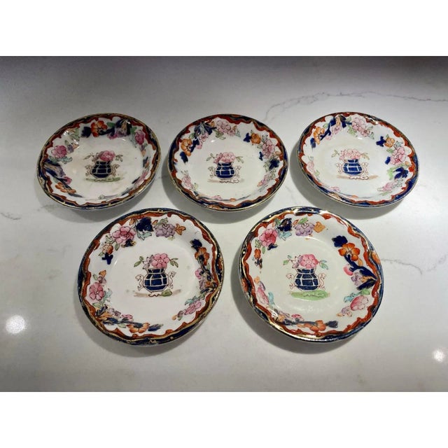 Set of earthenware decorative plates decorated in the Imari style Simlay pattern by Ridgway. Hand colored cobalt and gold...