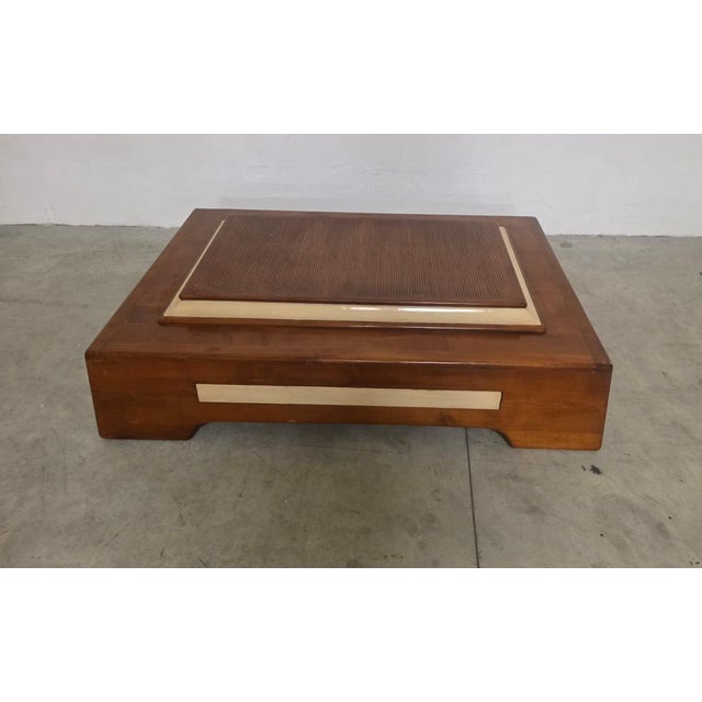 Elegant large French coffee table from the 1960s with a simple, linear style. Made of oak veneer with ivory-colored...