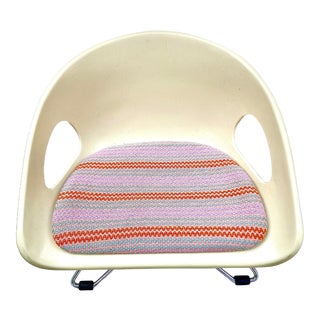 Mid-Century Modern Molded Plastic Cosco Children's Booster Chair in Milton Textiles For Sale