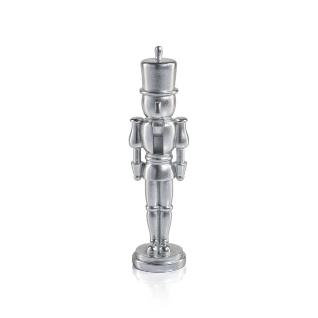 Elevate your holiday decor with the Hartwin Metallic Decorative Nutcracker Figurines. Featuring a striking metallic...