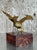 Graceful yet commanding, this vintage gilt bird sculpture captures the moment of mid-flight with striking movement and...