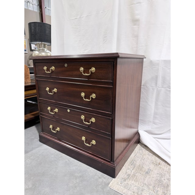 A beautifully crafted Henkel Harris file cabinet chest showcasing the brand’s renowned traditional craftsmanship and...