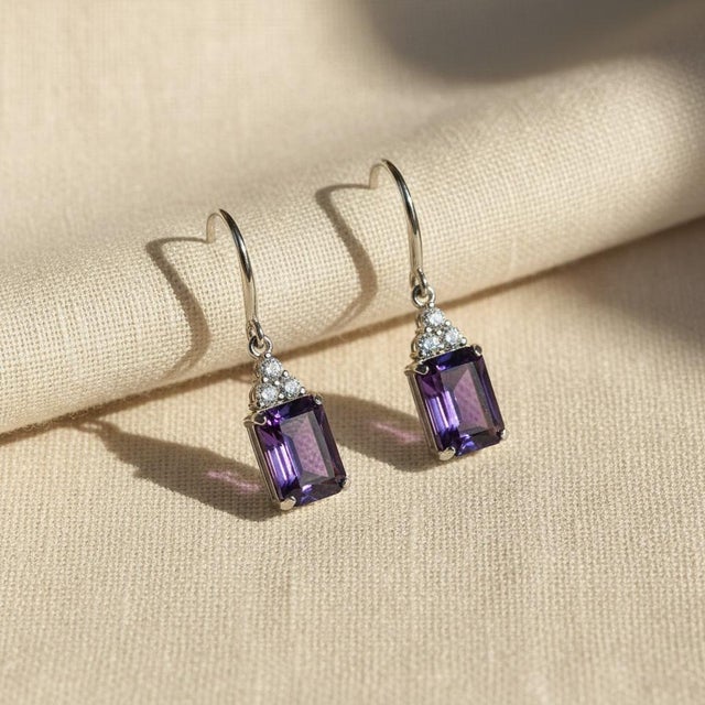 Dangle amethyst earrings. Danity octagon amethyst earrings. Metal type: 925 silver with 14k gold plating over Weight: 4.5...