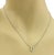 This authentic Tiffany & Co. horseshoe pendant necklace is crafted in solid 18k white gold with a polished finish and...
